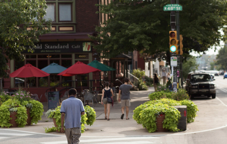 People walking on sidewalk